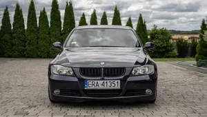 A freshly valeted car on a driveway.